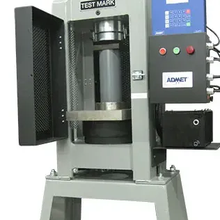 Image of compression fixture for ASTM C39 concrete cylinder testing