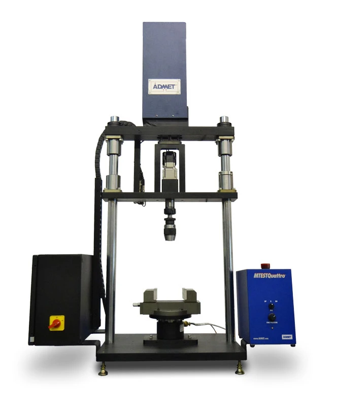 Image of eXpert 8602 axial-torsion testing system configured for ASTM F543 bonescrew testing