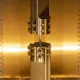 Closeup of sample inside environmental chamber during fatigue test