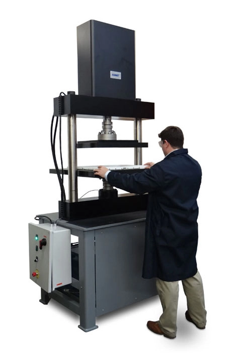 Image of man placing sample in eXpert 1900 testing system