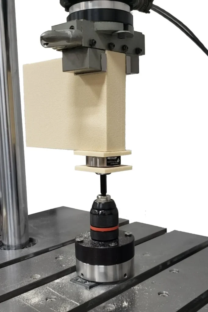 Image of ASTM F543 compression test setup