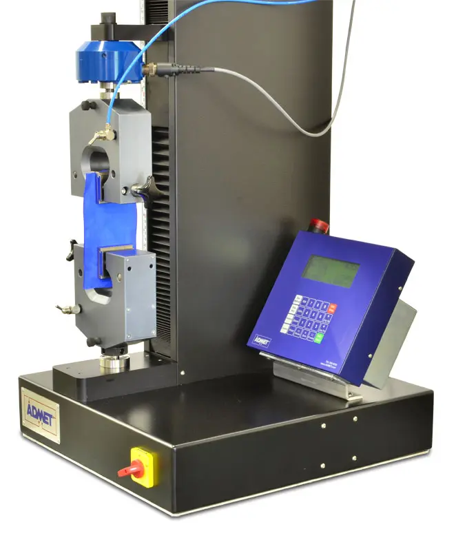 Image of eXpert 7600 and grips holding textile sample for ASTM D5035 test