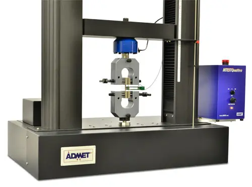 Image of eXpert 2600 with vise grips, sample, and extensometer