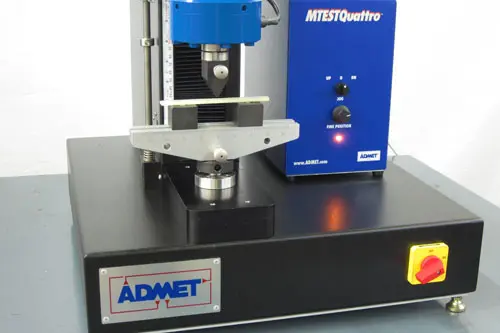 Image of eXpert 7600 with bend fixture and plastic sample