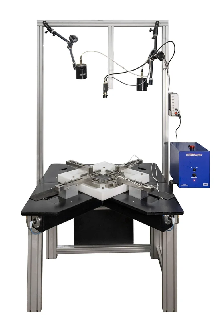 Image of custom planar biaxial system with fluid bath and digital image correlation