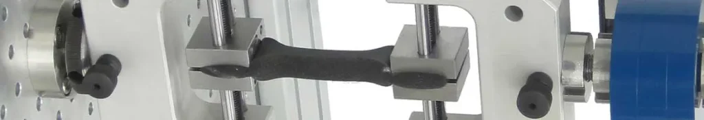Image of tensile grips and foam sample