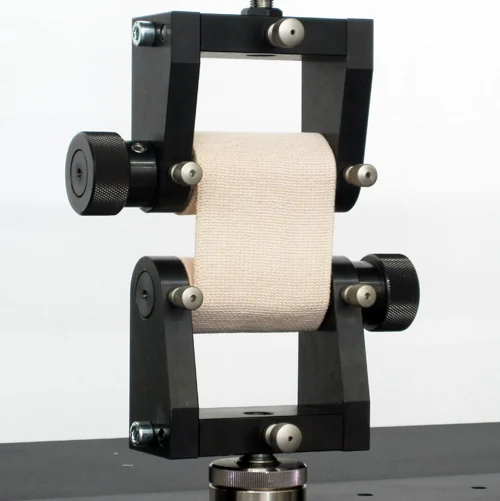 Bandage testing with a ribbon grip