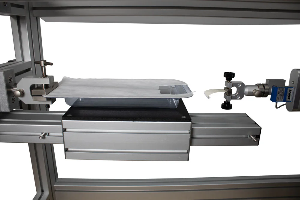 Custom designed package peel testing system