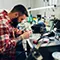 Electronics assembly worker