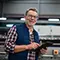 Man holding tablet in factory